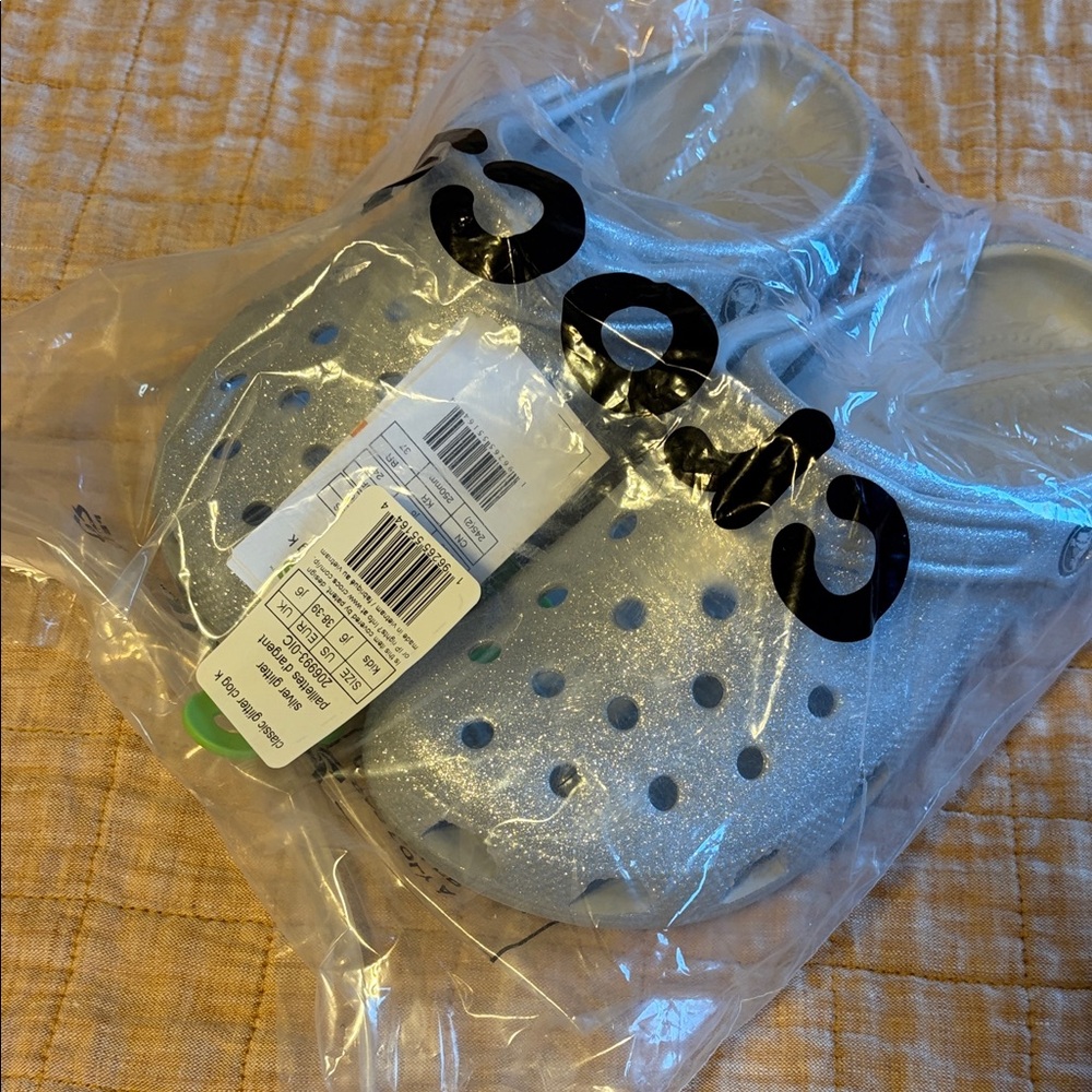 New Glitter Crocs in J6 or Women’s 8